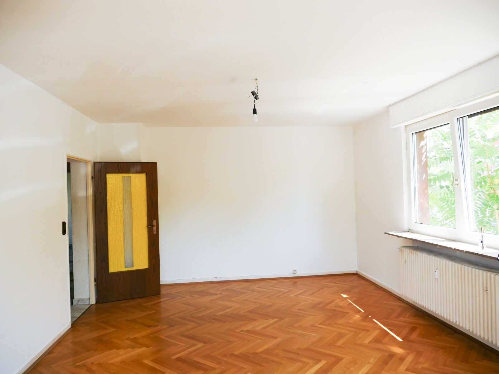 Geräumige Dreizimmerwohnung im Erdgeschoss